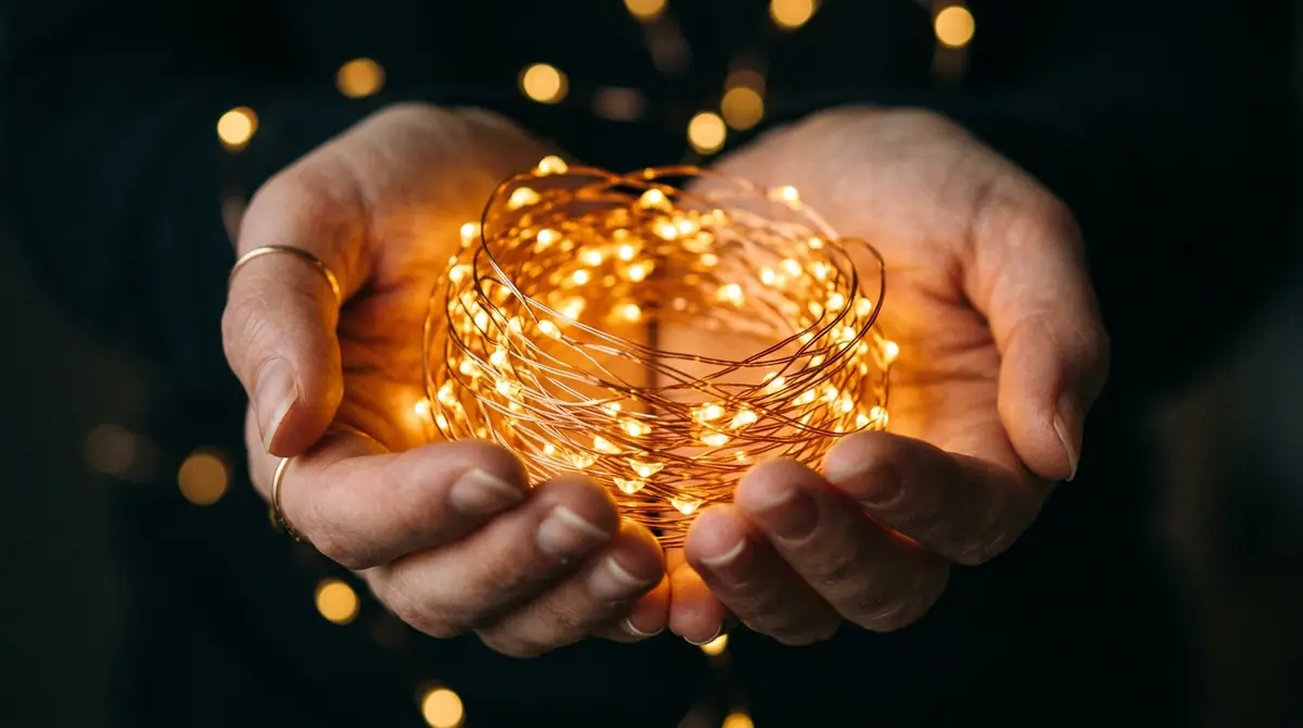 Holding glowing copper wire lights
